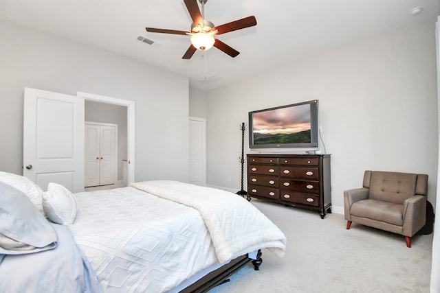 carpeted bedroom featuring ceiling fan