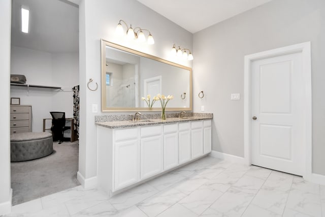 bathroom featuring vanity and walk in shower