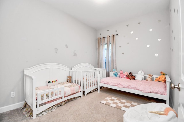 bedroom featuring carpet