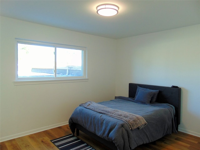 bedroom featuring wood-type flooring