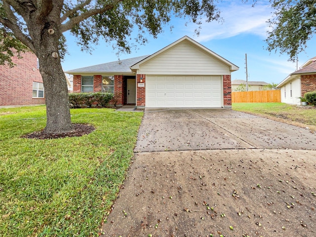 single story home with a front yard and a garage