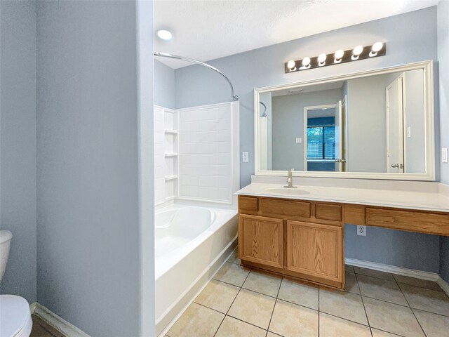 full bathroom with tile patterned floors, vanity, shower / bathing tub combination, and toilet