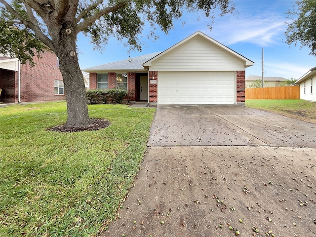 ranch-style house featuring a garage and a front lawn