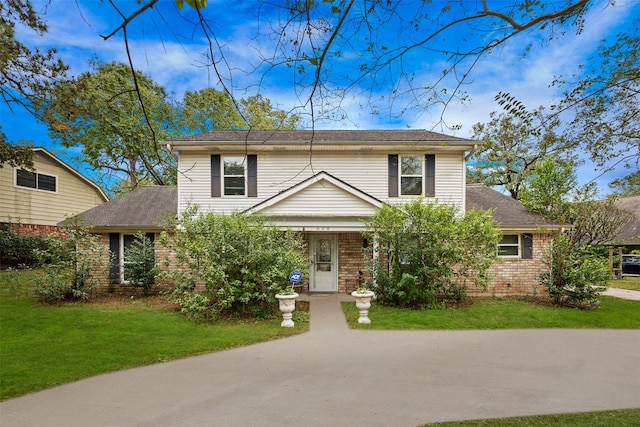 view of front property with a front lawn