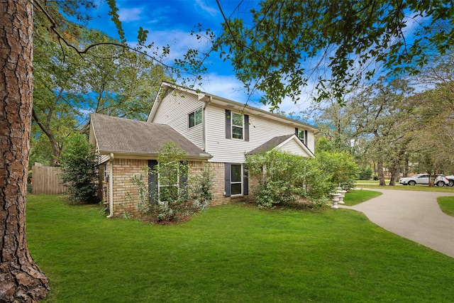 exterior space featuring a front lawn