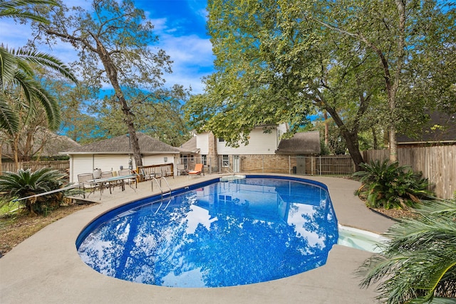 view of pool with a patio area