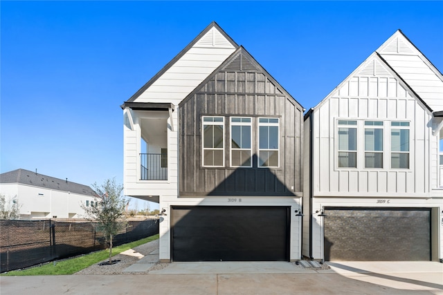 modern farmhouse featuring a garage