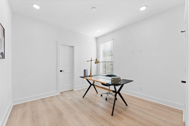 3109 Jensen Dr Unit B, Houston, TX 77026 - home office with light wood-type flooring