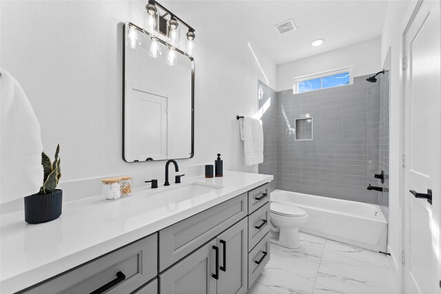 3109 Jensen Dr Unit B, Houston, TX 77026 - full bathroom featuring vanity, toilet, and tiled shower / bath combo