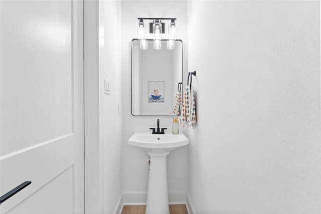 3109 Jensen Dr Unit B, Houston, TX 77026 - bathroom featuring hardwood / wood-style floors