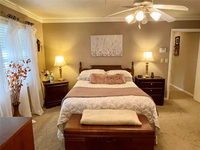 bedroom featuring ceiling fan, light colored carpet, and ornamental molding