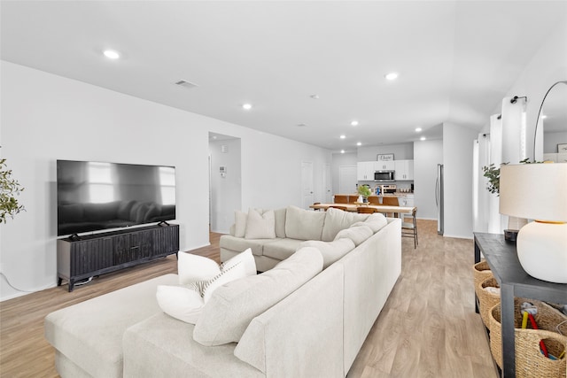 living room featuring light hardwood / wood-style flooring