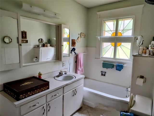 bathroom featuring a bathtub and vanity