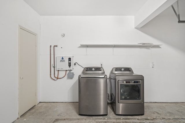 laundry room featuring separate washer and dryer