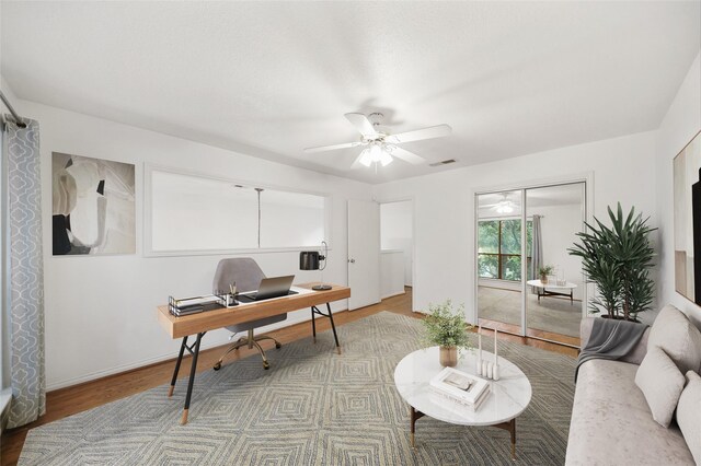 2555 Bering Dr Unit 1, Houston, TX 77057 - office with baseboards, visible vents, wood finished floors, and a ceiling fan