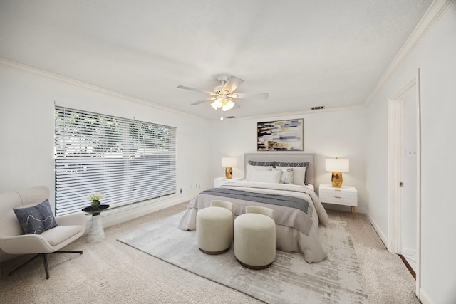 bedroom with light colored carpet, ceiling fan, and crown molding