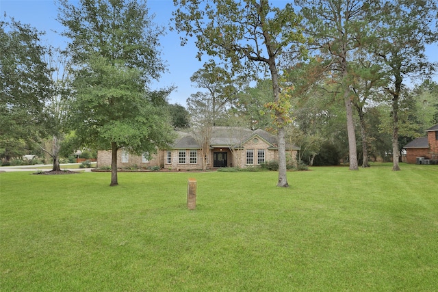 view of front of home with a front lawn