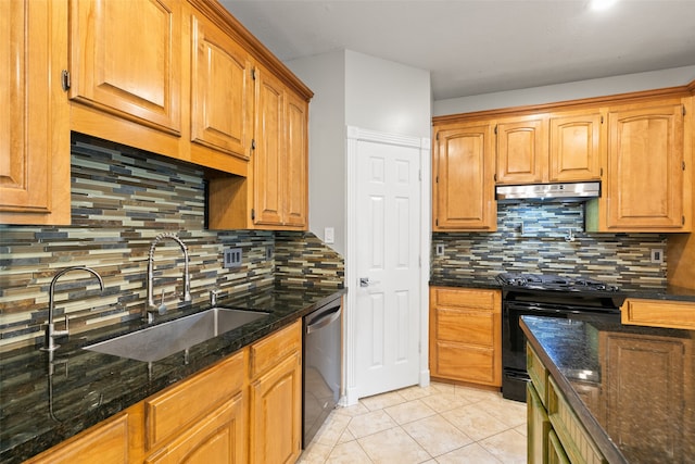 kitchen featuring light tile patterned floors, black range with gas cooktop, under cabinet range hood, a sink, and dishwasher