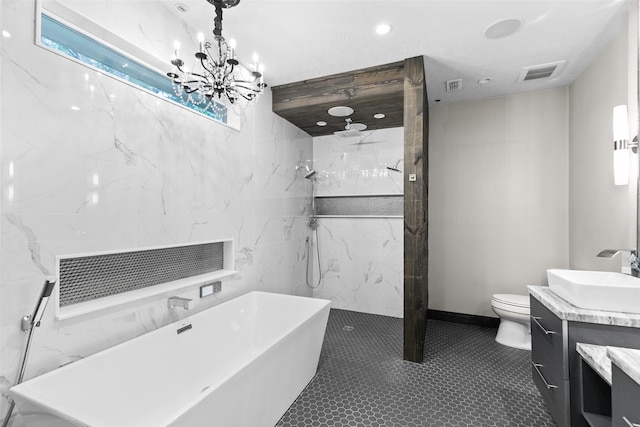 bathroom with a marble finish shower, a soaking tub, visible vents, toilet, and vanity