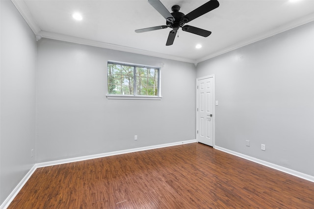 empty room featuring recessed lighting, crown molding, baseboards, and wood finished floors