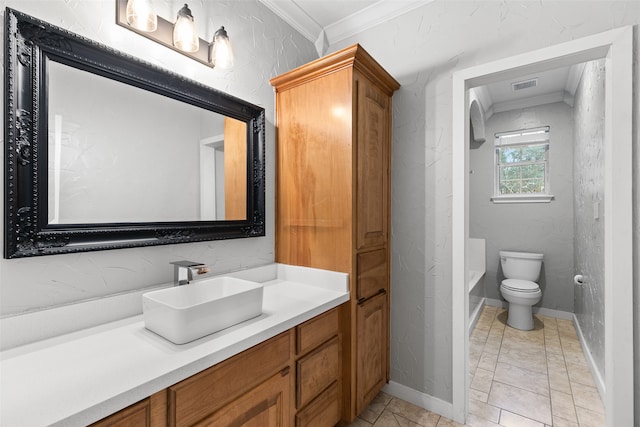 bathroom with a tub to relax in, crown molding, vanity, and toilet