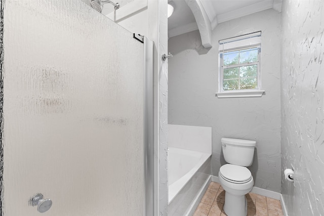 bathroom featuring a tub to relax in, toilet, baseboards, tile patterned floors, and walk in shower