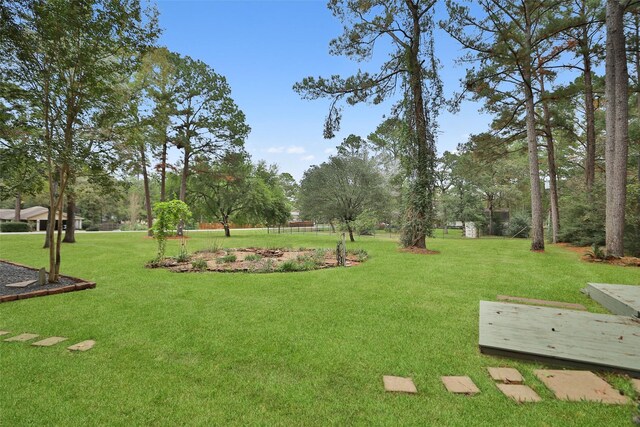 view of community with a lawn