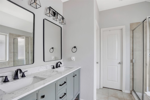 bathroom featuring vanity, tile patterned floors, and an enclosed shower