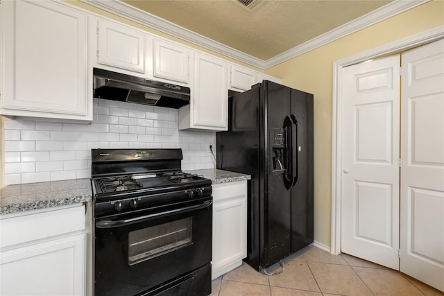 kitchen featuring white cabinets, light tile patterned floors, light stone counters, and black appliances