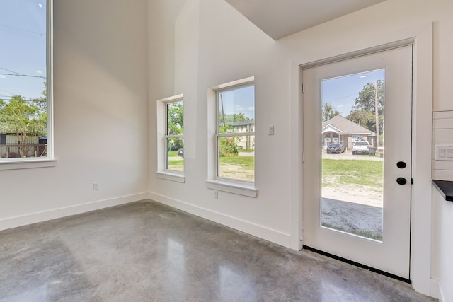 doorway with concrete floors