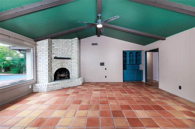 unfurnished living room with vaulted ceiling with beams, ceiling fan, light tile patterned floors, and a fireplace