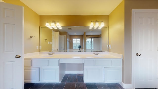 bathroom with vanity and an enclosed shower