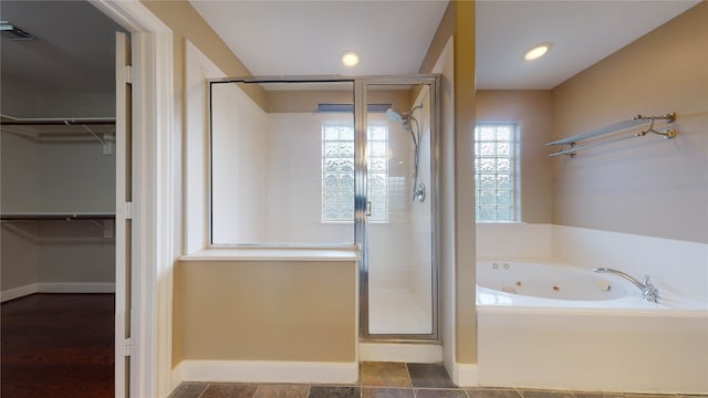 bathroom with independent shower and bath