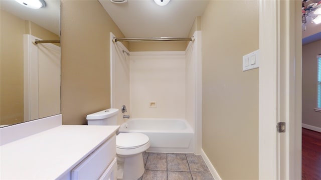 full bathroom with toilet, vanity, tile patterned floors, and shower / washtub combination