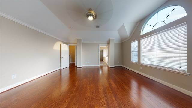 unfurnished room with ornamental molding, lofted ceiling, ceiling fan, and dark wood-type flooring