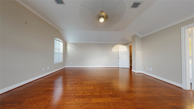 unfurnished room with ceiling fan, dark hardwood / wood-style flooring, lofted ceiling, and ornamental molding