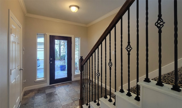 foyer featuring crown molding