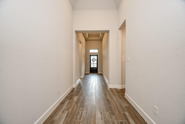 corridor with dark wood-type flooring