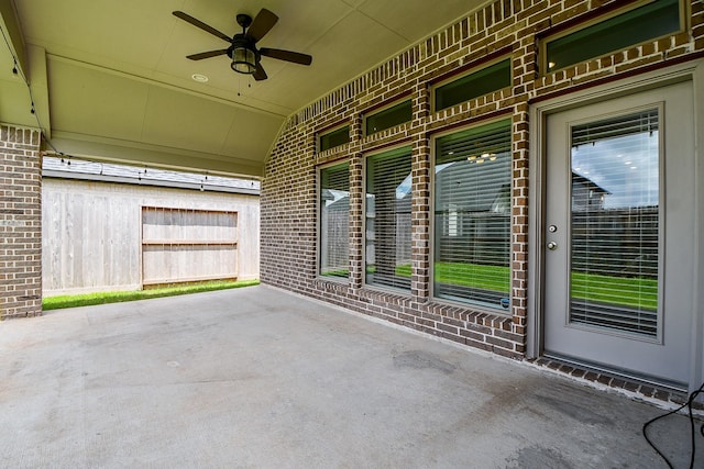 view of patio / terrace with ceiling fan and a porch