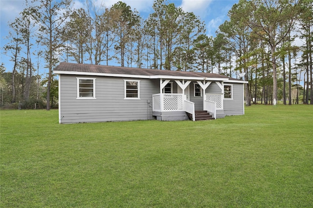 view of front of property with a front lawn