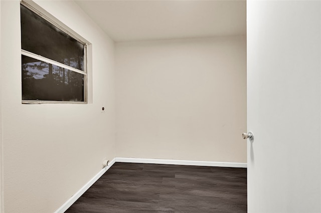 empty room featuring dark hardwood / wood-style floors