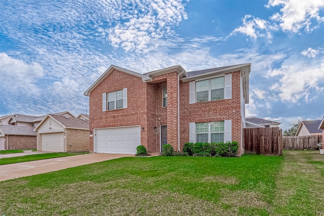 view of front of home featuring a garage and a front lawn