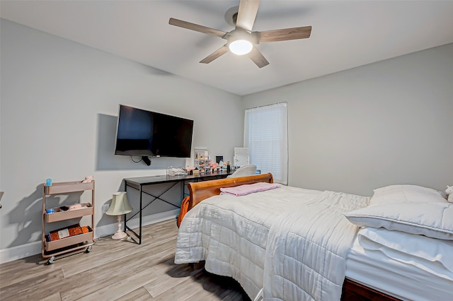 bedroom featuring ceiling fan and light wood-type flooring