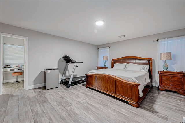 bedroom featuring light hardwood / wood-style floors