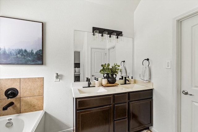 bathroom featuring a bathing tub and vanity