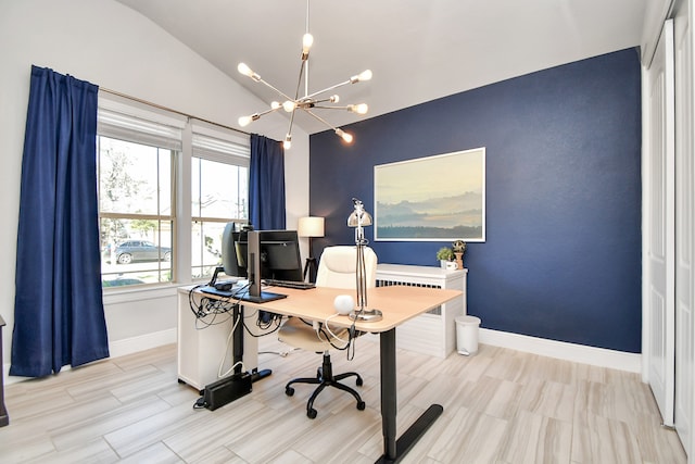 office space featuring an inviting chandelier and vaulted ceiling