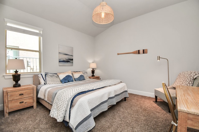 carpeted bedroom with vaulted ceiling