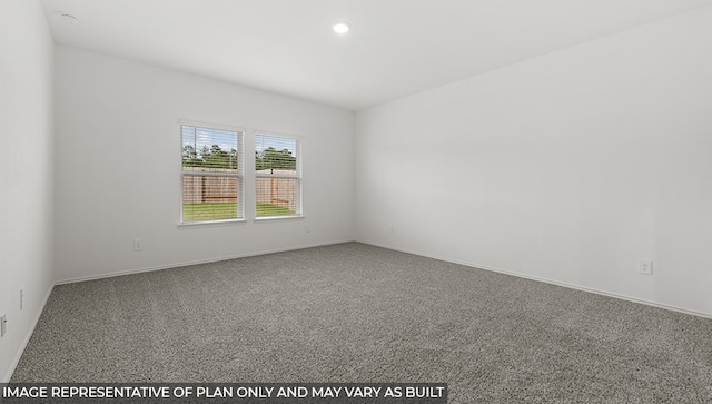 unfurnished room with carpet