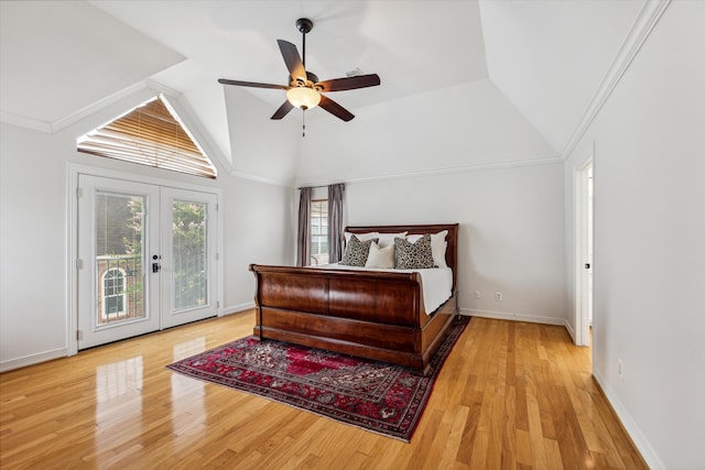 bedroom featuring french doors, access to outside, vaulted ceiling, ceiling fan, and light hardwood / wood-style floors