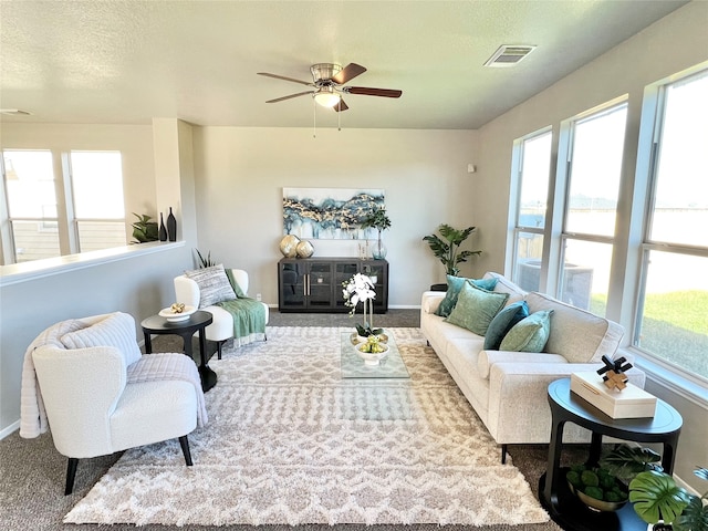 sunroom with ceiling fan